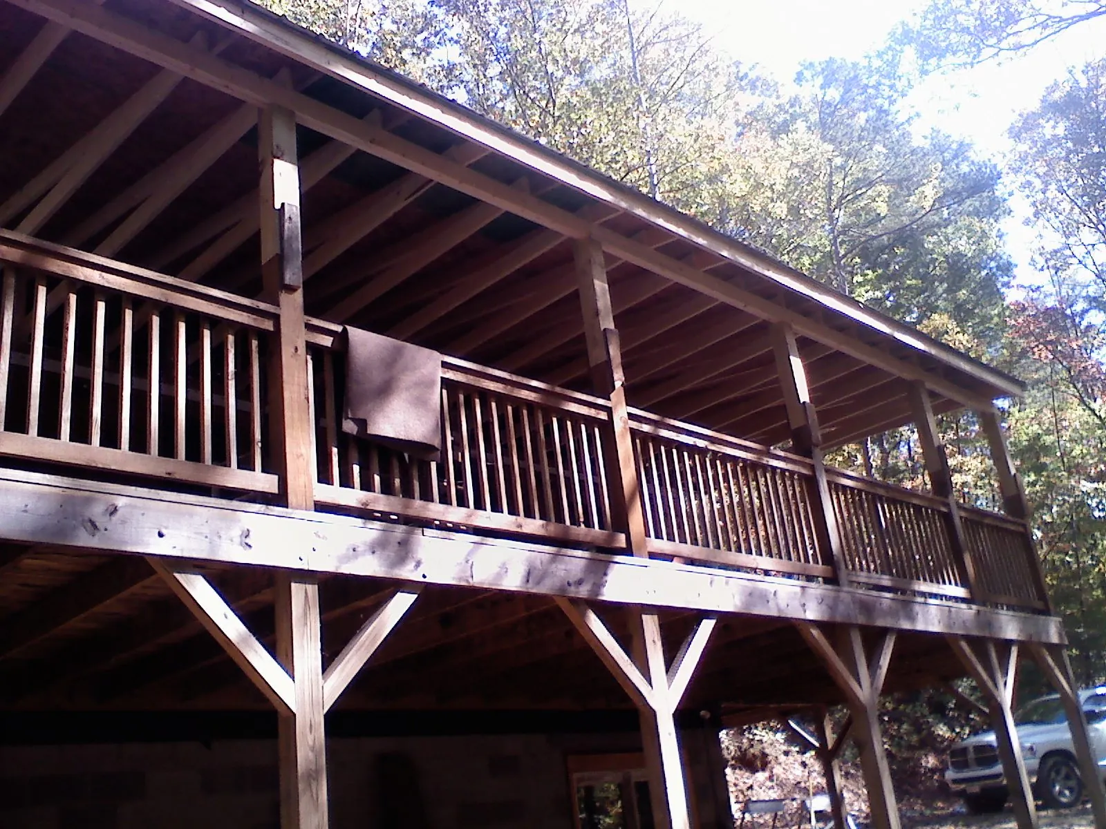 Timber framing under a new elevated porch and deck — Roof Leak Repair in Horseheads by Roofing Brothers